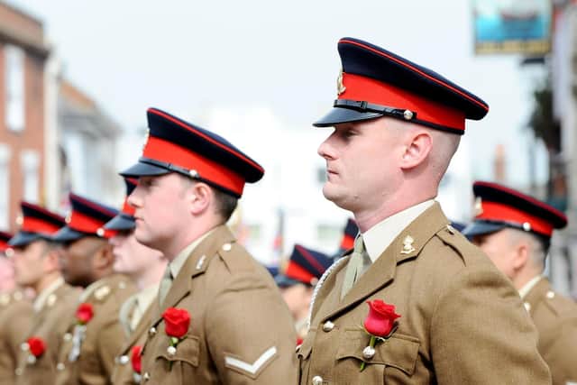 More than 60 veterans were joined by serving soldiers from Thorney Island and school children. Picture: Sarah Standing (230419-5808)