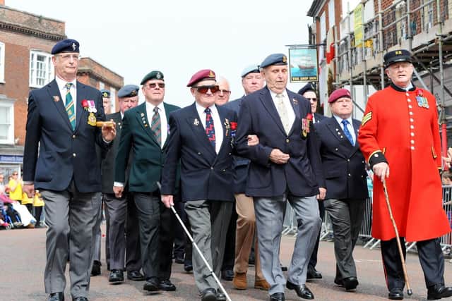 The annual St George's Day parade took place in Emsworth. More than 60 veterans were joined by serving soldiers from Thorney Island and school children. Picture: Sarah Standing (230419-5818)