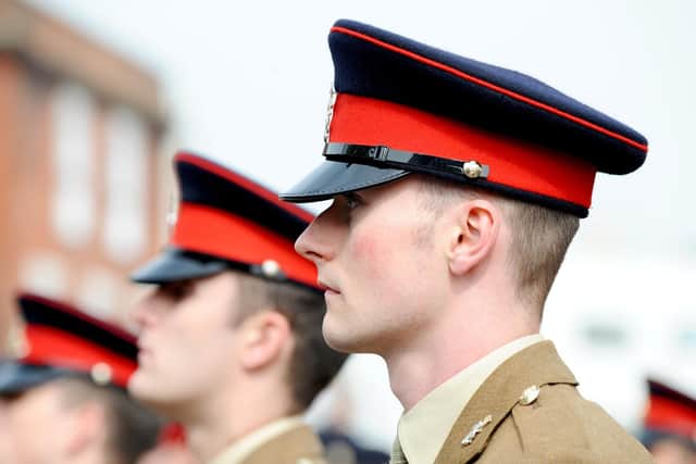 More than 60 veterans were joined by serving soldiers from Thorney Island and school children. Picture: Sarah Standing (230419-5752)