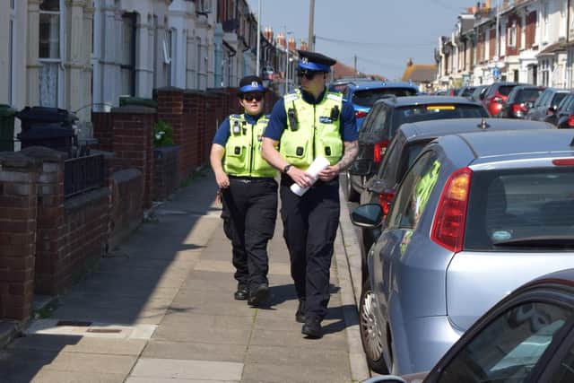 PCSOs from Hampshire Police patrolling Lynton Grove where the stabbing took place last night. Photo: Tom Cotterill