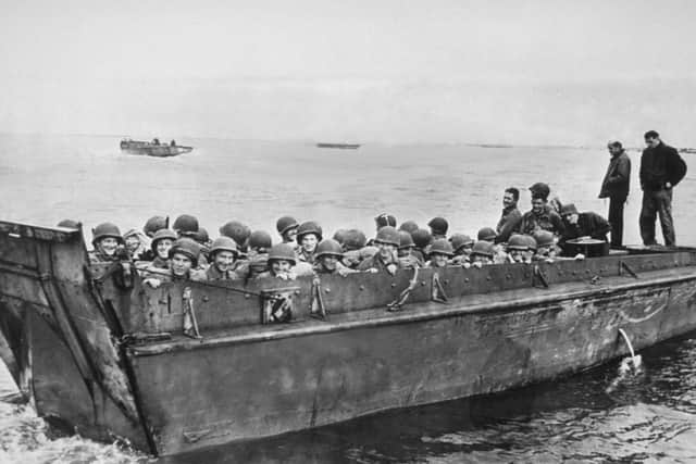 Invasion Embarkation 6th June 1944:  American soldiers on a landing craft on their way to the Normandy beaches, during the invasion of Europe.  (Photo by Keystone/Getty Images)