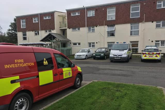 Forensic examiners at the block of flats in Jervis Drive, Gosport, on October 24