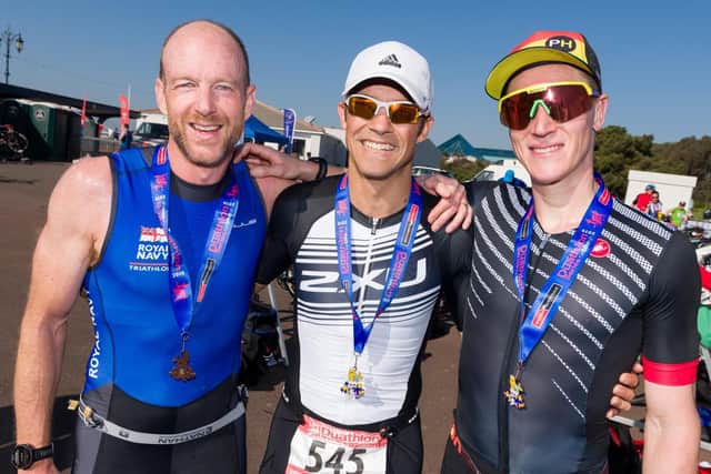 Portsmouth Duathlon Series podium: Neil Collins, centre, with Kris Nicholson, left, and Rob Arkell, right. Picture: Duncan Shepherd