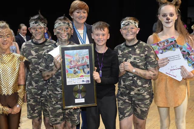 Hampshire High Sherrif presents first place to Wicor. First Place, congratulations to Wicor Primary School, Portchester, Hampshire. Pangolins: Slaughtered for Scales.
Pangolins (or scaly anteaters) live in Africa. These enigmatic mammals eat thousands of termites a day. Pangolins are being hunted for their scales which are mistakenly believed to have powerful medicinal properties. They are shipped dead or alive to be traded in Asian street markets. Pangolins are the most trafficked animal in the world; facing extinction. We must act now.