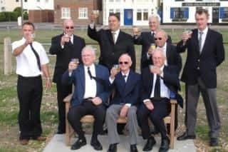 Michael's family members toasting to him at the bench, following a memorial service in 2006