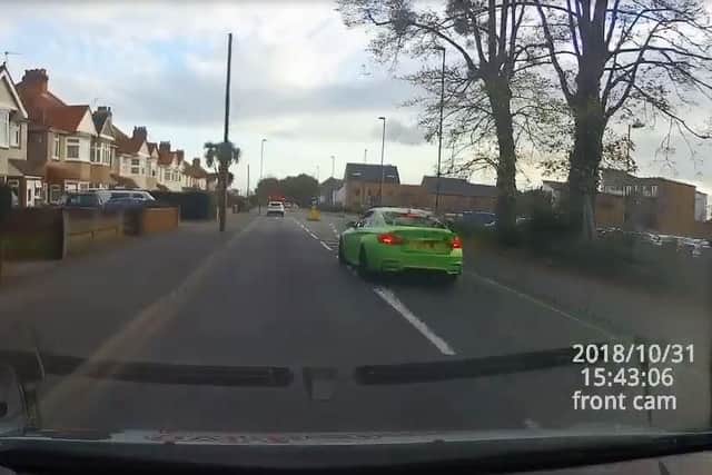 Screen shot from dash cam footage showing reckless driver overtaking on Hampshire road. Picture: Hampshire Police