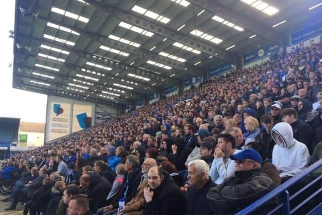 Fans watching big screen