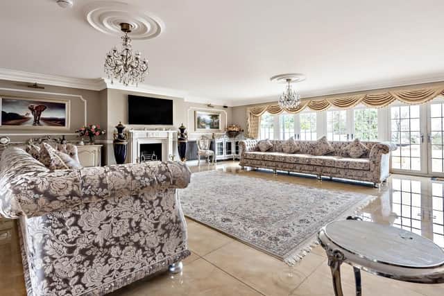 It has a garage, gymnasium and generous grounds.