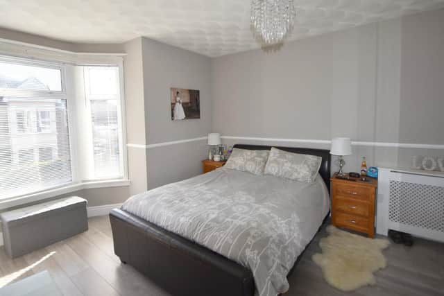 It has three bedrooms and it is a terrace house.