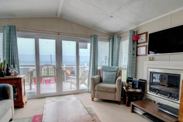 It has two bedrooms and a balcony with direct views of the harbour