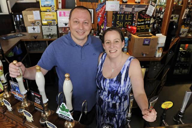Dev and Ali Wearn celebrate after their pub The Lawrence Arms in Southsea won the Portsmouth and SE Hants CAMRA pub of the year award. 
Picture: Ian Hargreaves  (200419-3)