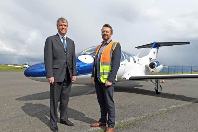 (left to right) Cllr. Sean Woodward with Solent Airport Daedalus Manager Martyn Francis 
Picture by:  Malcolm Wells (190403-8699)