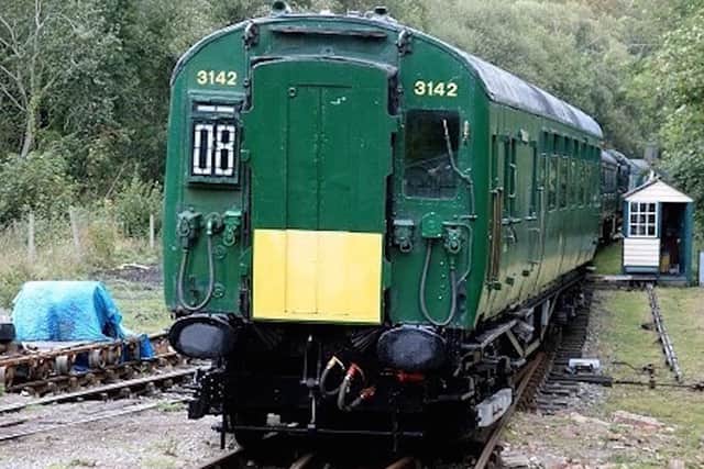 One of the two carriages of 4-COR 3142 preserved on the East Kent Railway.