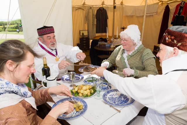The Colenel's table - (L-R) Helen Ardle (maid), Adrian Lobb (Colonel, 3rd Foot Guards) Kate Lobb (colonel's wife) and Chris Osward (lieutenant, 3rd Foot Guard). Picture: Duncan Shepherd