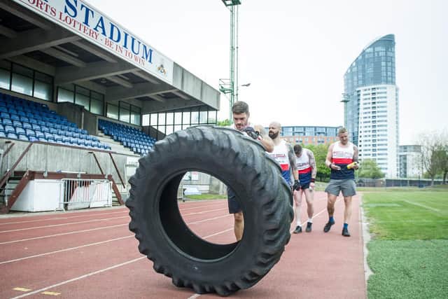 Dan Kerr flipping a tyre
Picture: Habibur Rahman