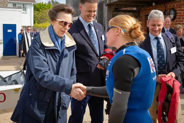 HRH The Princess Royal pictured with British Olympic sailing hopeful Jess Lavery (right) during her visit to Emsworth Sailing Club today. The visit was arranged to help the club celebrate its centenary.