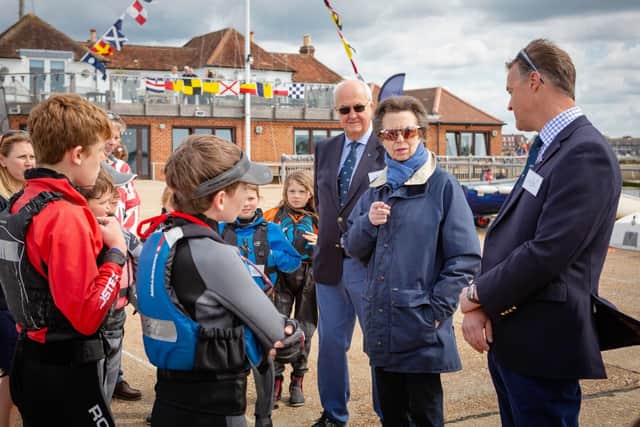 HRH The Princess Royal pictured with junior members, Michael Geary, Commodore (in glasses) and Tim Keeping Rear Commodore (right) during her visit to Emsworth Sailing Club today.
Photograph by Christopher Ison 
07544044177
chris@christopherison.com
www.christopherison.com