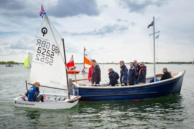 British Olympic sailing hopeful Jess Lavery performs a sail past in an Optimist dinghy in front of HRH The Princess Royal.
Photograph by Christopher Ison 
07544044177
chris@christopherison.com
www.christopherison.com