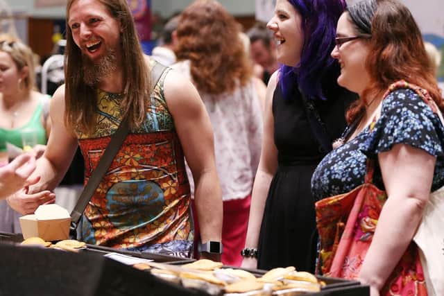 From left, Mat Carey, Michelle Morgan and Sarah Birch. Portsmouth Vegan Festival 2019, Portsmouth Guildhall. Picture: Chris Moorhouse (200419-20)