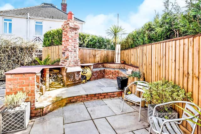 It has front and rear gardens, the later comes with an outside Chiminea area!