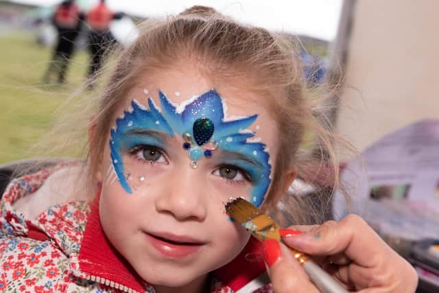 Winter-Blu Glossop, age four, gets her face painted. Picture: Duncan Shepherd