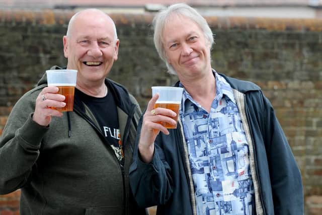 (l-r) Alex Hood and Jon MacDonald from Portsmouth enjoy a beer. Picture: Sarah Standing (060519-7147)