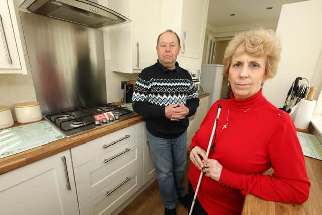 Teresa and Stephen Meade of Southsea, are very disappointed with this Wickes kitchen. A plumber has advised that the hob is loose and is not to be used.                Picture: Chris Moorhouse           (140419-42)