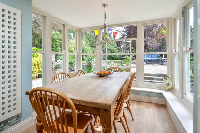 It has five bedrooms, three reception rooms and a home office.