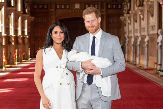 The Duke and Duchess of Sussex with their baby son, who was born on Monday morning, during a photocall in St George's Hall at Windsor Castle in Berkshire.
