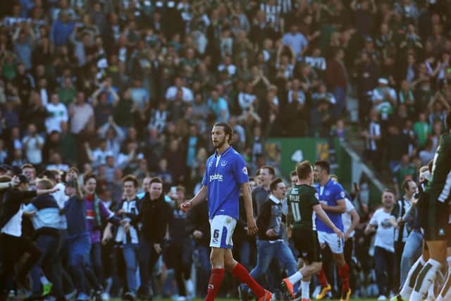 Pompey's Christian Burgess after Plymouth's late play-off win in 2016. Picture: Joe Pepler.