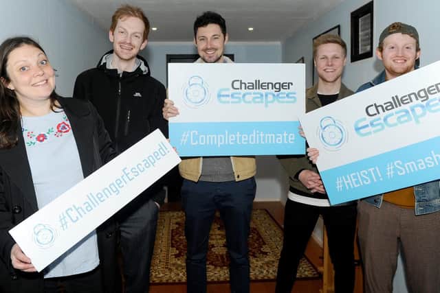 Staff from The News, Portsmouth, had a go at the escape room in a shipping container at The Pyramids, Southsea, run by Challenger Escapes on Wednesday, April 24.

Pictured is: (l-r) Kimberley Barber, Ben Fishwick, Richard Lemmer, Byron Melton and Matt Mohan-Hickson.

Picture: Sarah Standing (240419-7053)