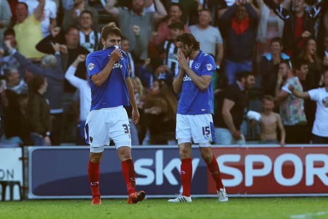 Ben Close dejected after Peter Harley's goal for Plymouth knocked Pompey out of the play-offs three years ago. Picture: Joe Pepler