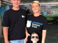 Tommy Chambers with dad Anthony and mum Chelsea