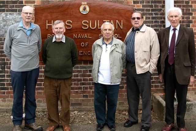 Here we see a group of former artificers at the reunion.