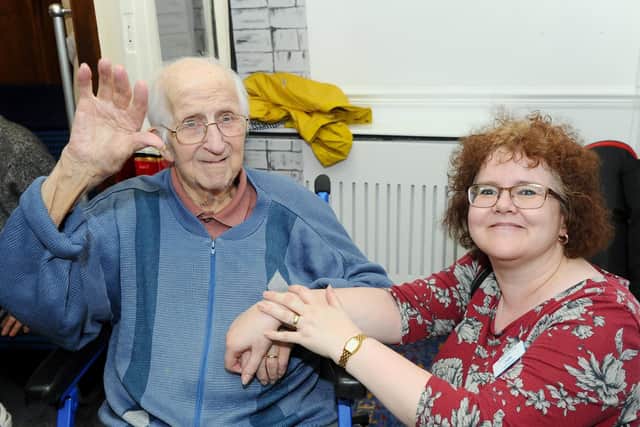 Resident Colin Bennett with Julie Holland, administrator. Picture: Sarah Standing (100519-9037)