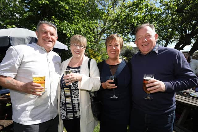 From left, Phil and Lynn Nichols, and Fiona and Gary Fitt. Fundraising event at the Fighting Cocks pub, Clayhall, Gosport, in aid of a community defibrillator.                       Picture: Chris Moorhouse    (110519-30)