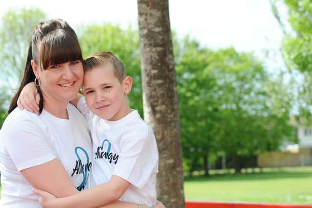 Jake Davies, eight, with his mum Vicky Davies.
Picture: Sarah Standing (100519-7519)