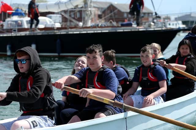 Rowing crew from Gosport Sea Scouts. Gosport Marine Festival at Haslar Marina, Gosport. Picture: Chris Moorhouse (110519-24)