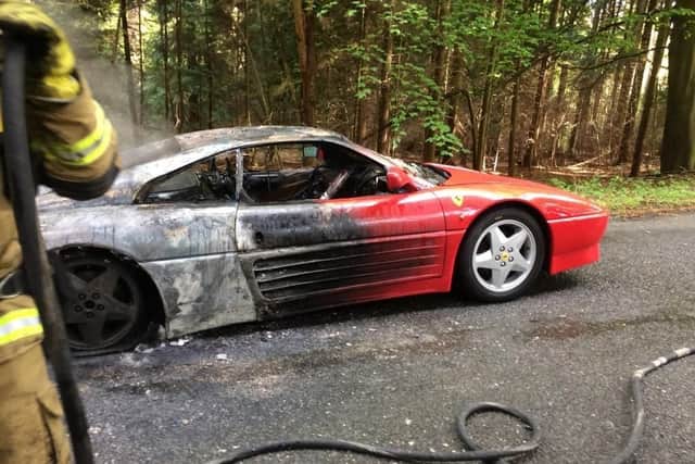 The Ferrari on fire in Hundred Acres Road. Picture: Hampshire Fire and Rescue
