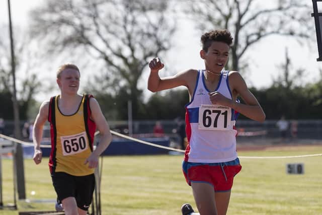 Cameron Walker-Powell won the under-15 1,500m with an excellent performance in a time of 4.32.26. In a close battle he managed to get the better of Basingstokes Nathan Lane, 650, who finished second in 4.32.82. Picture: Paul Smith