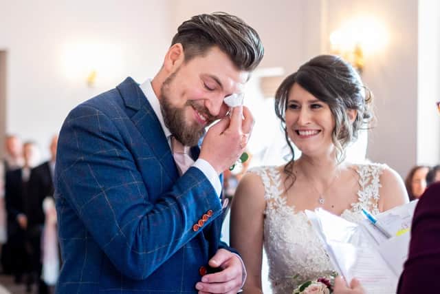 Mr and Mrs Postins during the ceremony. Picture: Carla Mortimer Photography