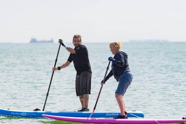 Instructor Sean Rayner with Bridget Simmons who had just overcome an operation to complete a bucket list wish. Picture: Keith Woodland (110519-45)