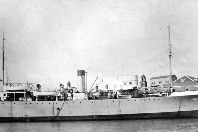 Mystery location found. Yesterday's  photograph with the bell tower and mining trials tank within HMS Vernon. Picture: Robert James Collection.