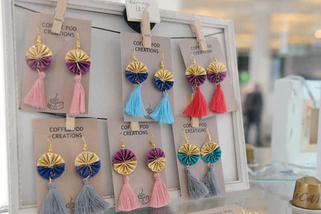 Victoria Knight (28) from Gosport, started making jewellery out of coffee pods two years ago called Coffee Pod Creations. Picture: Sarah Standing (100519-8997)