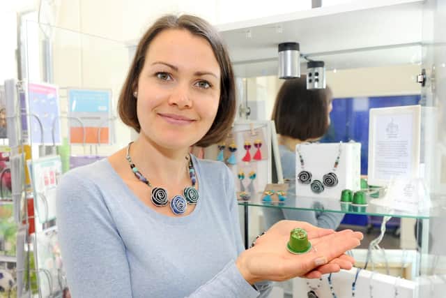 Victoria Knight (28) from Gosport, started making jewellery out of coffee pods two years ago called Coffee Pod Creations. Picture: Sarah Standing (100519-8988)