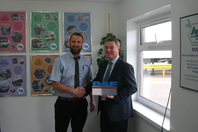 Adams Morey Service Operations Manager, Stan Brimecome receives the prestigious DAF Trucks Service Dealer of the Year Award from Ross Taviner, DAF Trucks After Sales Manager
