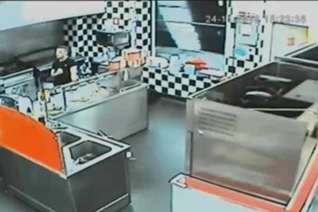 CCTV shows Harry Middleton in the Wimpy kitchen at Hayling Island's Funland on November 24. To the right of the image is the door into the store room. Picture: CPS Wessex