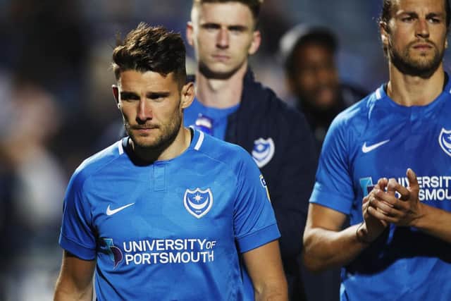 Gareth Evans, Oli Hawkins and Christian Burgess at the final whistle