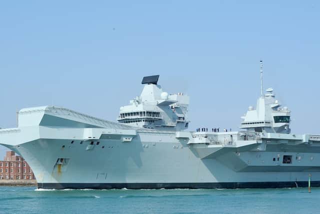 HMS Queen Elizabeth leaving Portsmouth Naval Base on Monday, April 1 and heading up to Rosyth, Scotland, for dry-dock maintenance. Picture: Sarah Standing (010419-4451)