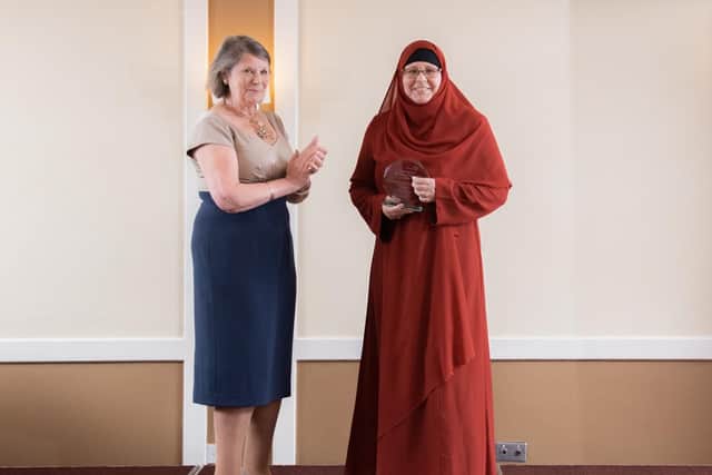 Tanya Harrison, Community Midwife, winner of the Working Together with Compassion Award presented by Melloney Poole, Chairman.